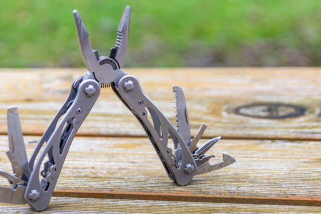 Leatherman multitool on wooden table