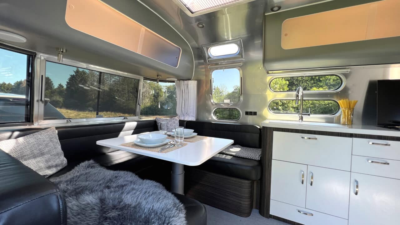 Innovations at Caravan Salon 2023: Airstream Germany presents luxury caravan with comfort bathroom and kitchen with oven 2 Airstream International 25IB Lounge