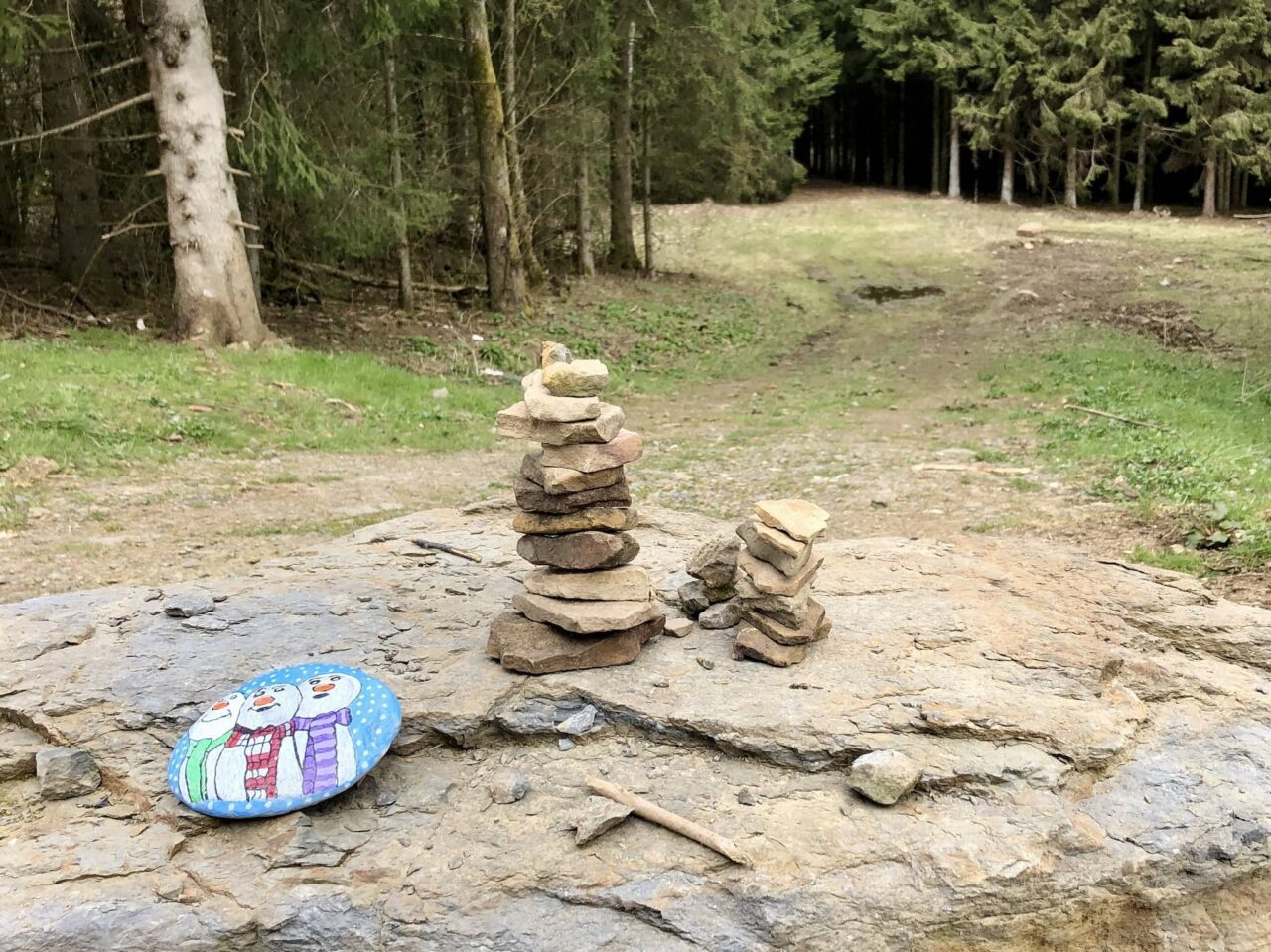 Painting stones as an outdoor activity when camping with children
